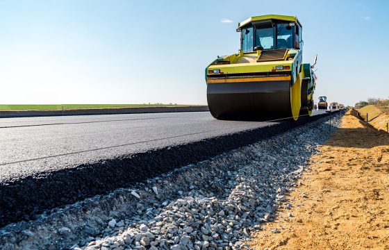 Road rollers building the new asphalt road